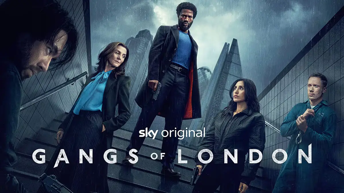 Affiche de la série d'action Gangs of London, montrant les acteurs dans un escalier du métro de Londres avec les gratte-ciel emblématiques de la capitale du Royaume-Uni en arrière plan sous la pluie
